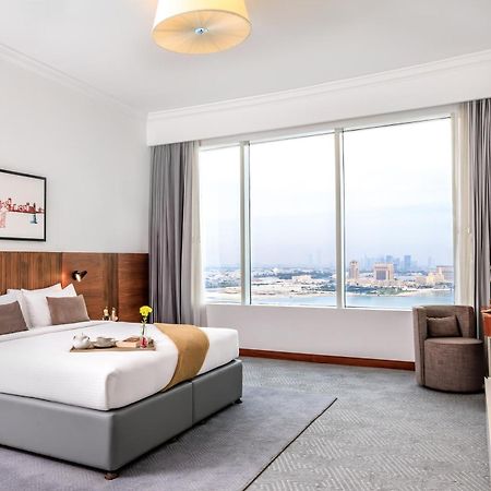 Somerset West Bay Doha Eksteriør bilde A bedroom at the hotel